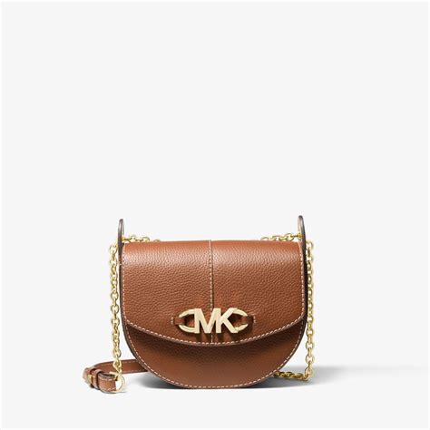 michael michael kors izzy small pebbled leather saddle crossbody bag|Izzy Small Pebbled Leather Saddle Crossbody Bag .